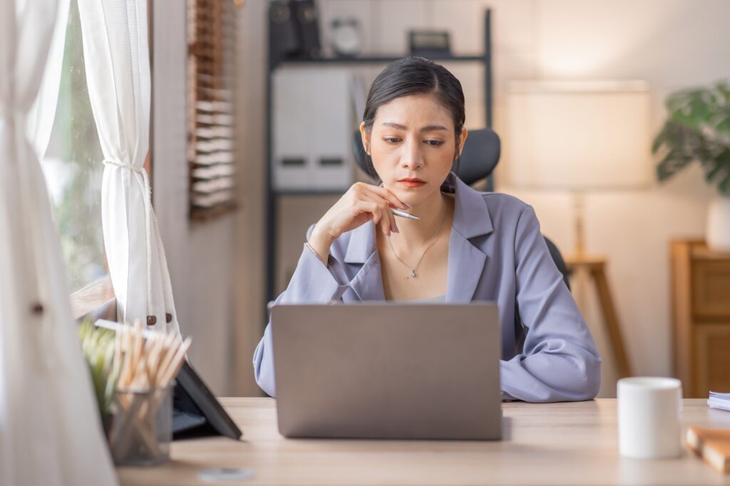 Portrait woman of smiling Happy Young Asian female freelancer working at home, Asian finance account Portrait woman of smiling Happy Young Asian female freelancer working at home, Asian finance account